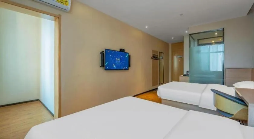 Bed in IU Hotels Xinzhou Bus Terminal