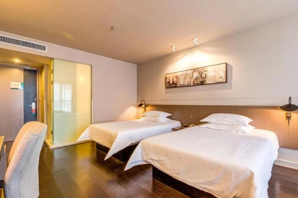 Bed in Jinjiang Inn Select Xixian New Distict Century Avenue