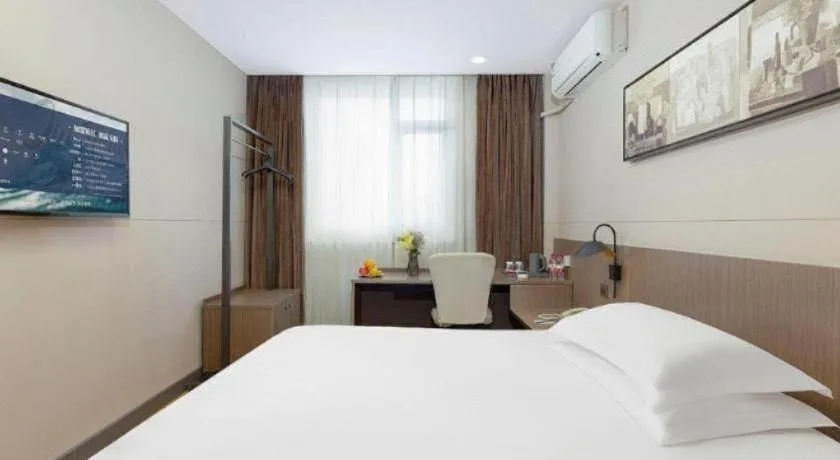 Bed in Jinjiang Inn Select Tianjin Xiaobailou Metro Station