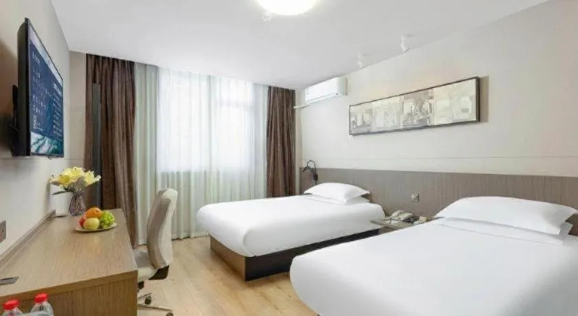 Bed in Jinjiang Inn Select Tianjin Xiaobailou Metro Station