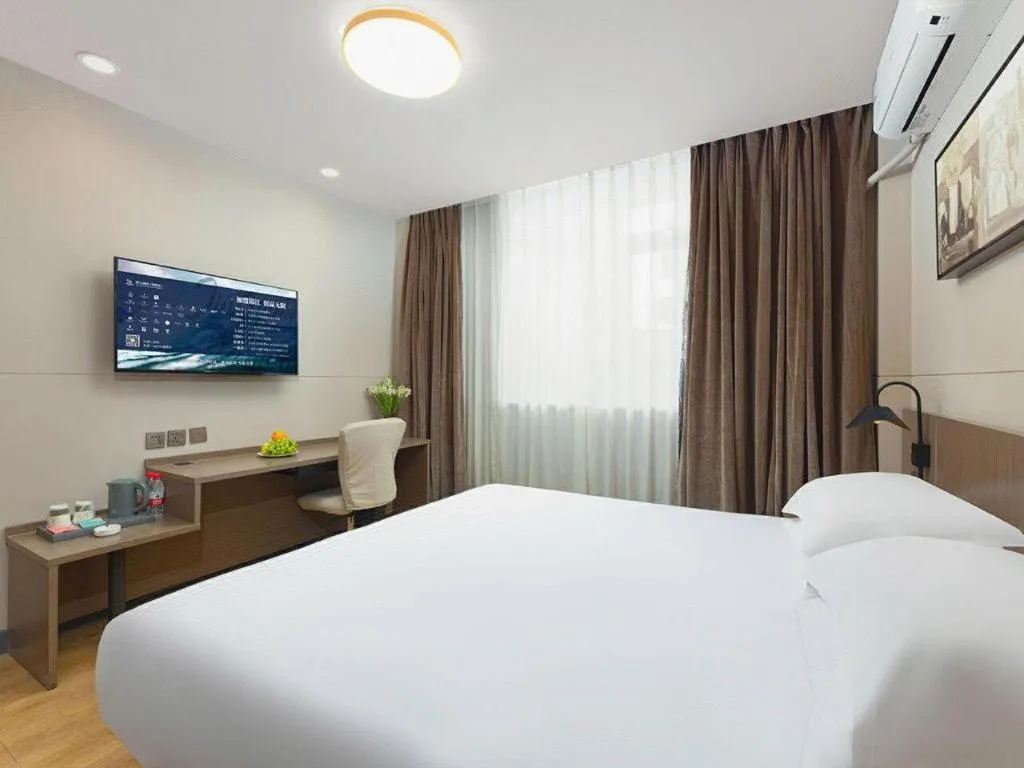 Bed in Jinjiang Inn Select Tianjin Xiaobailou Metro Station