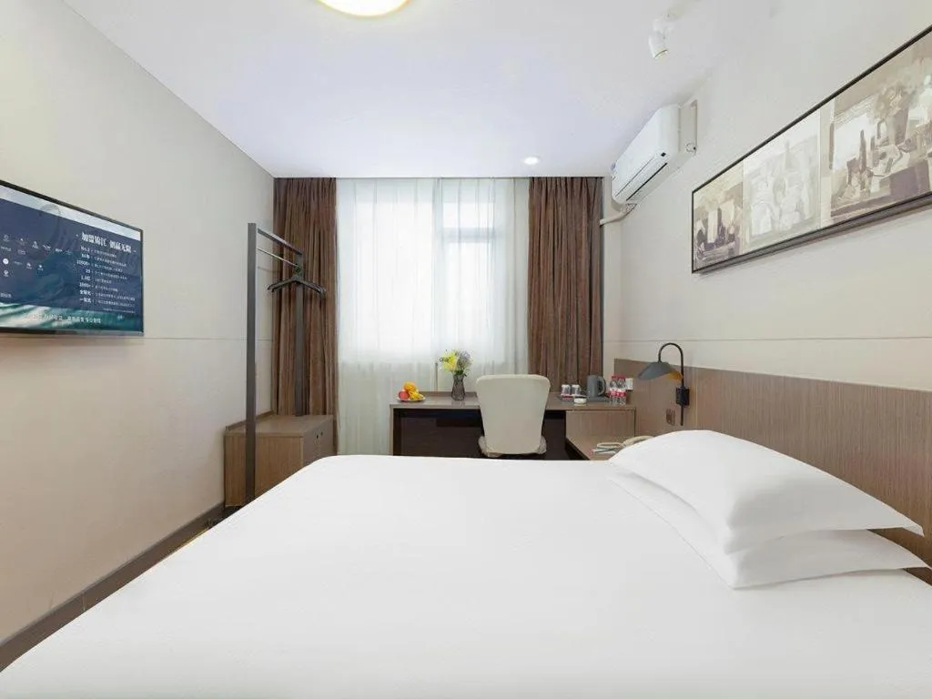Bed in Jinjiang Inn Select Tianjin Xiaobailou Metro Station