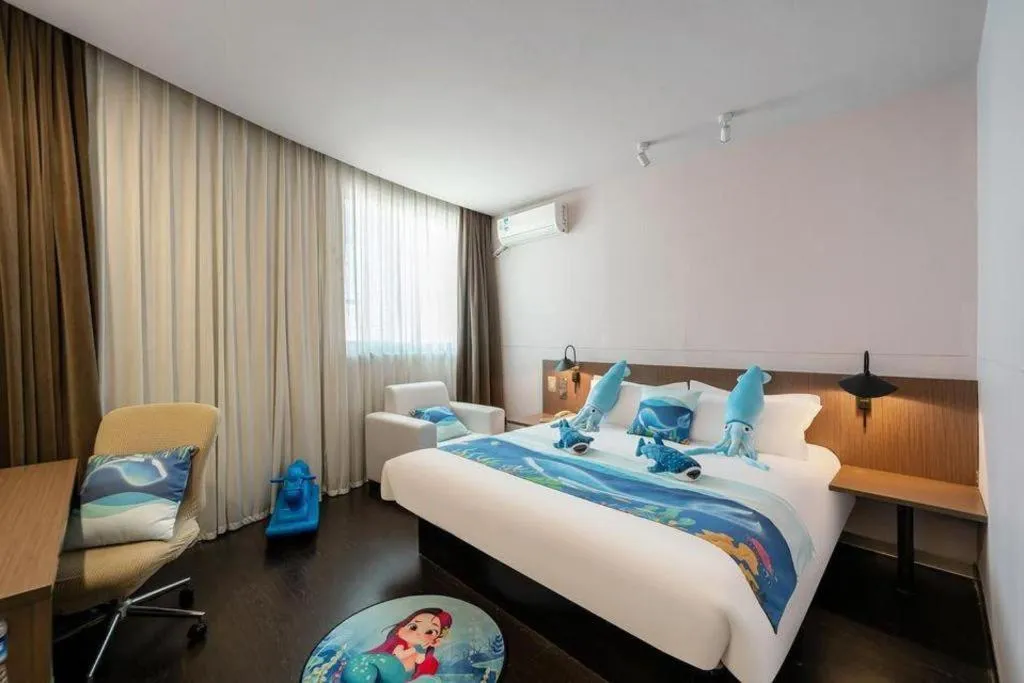 Bed in Magnotel Hotel Shanghai Railway Station Magnolia Plaza