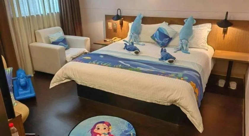 Bed in Magnotel Hotel Shanghai Railway Station Magnolia Plaza