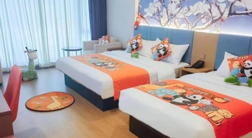 Bed in Magnotel Hotel Shanghai Railway Station Magnolia Plaza