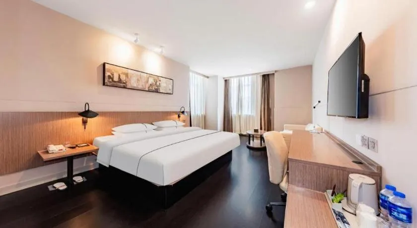 Bed in Jinjiang Inn Select Hohhot Chengjisihan Square Metro Station