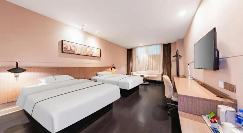 Bed in Jinjiang Inn Select Hohhot Chengjisihan Square Metro Station