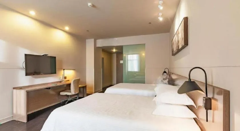 Bed in Jinjiang Inn Select Hohhot Chengjisihan Square Metro Station