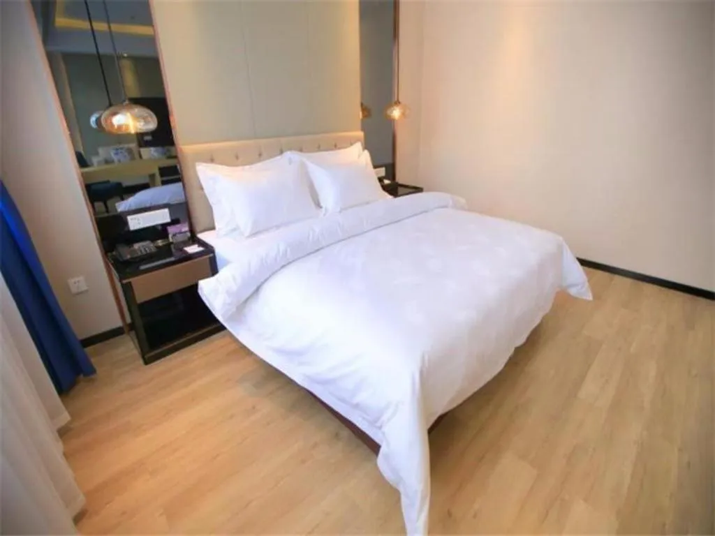 Bed in Jinjiang Metropolo Fuxin Yingbin Street Railway Station