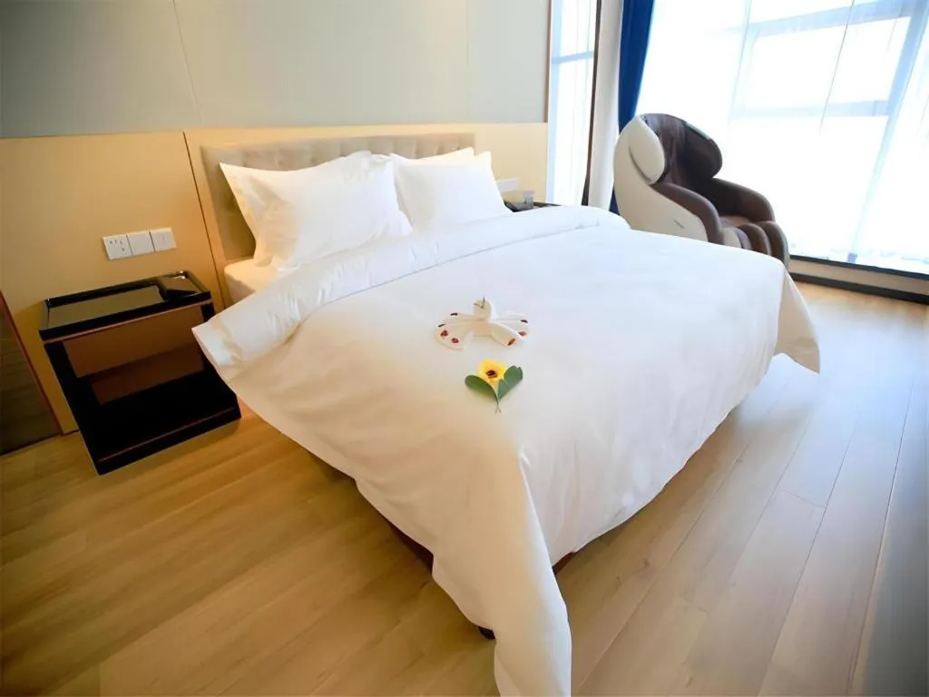 Bed in Jinjiang Metropolo Fuxin Yingbin Street Railway Station