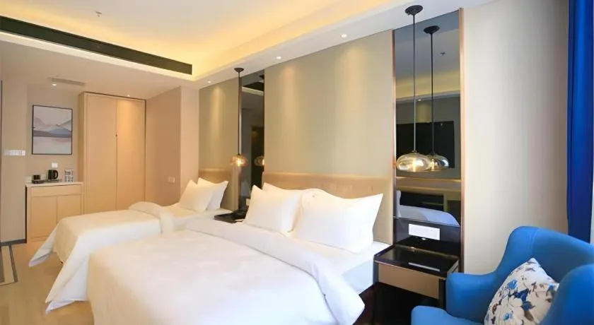 Bed in Jinjiang Metropolo Fuxin Yingbin Street Railway Station