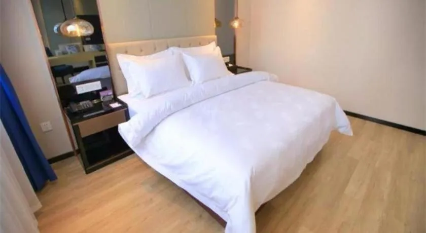 Bed in Jinjiang Metropolo Fuxin Yingbin Street Railway Station