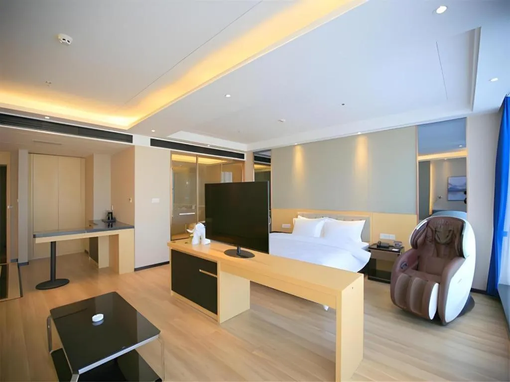 Bed in Jinjiang Metropolo Fuxin Yingbin Street Railway Station