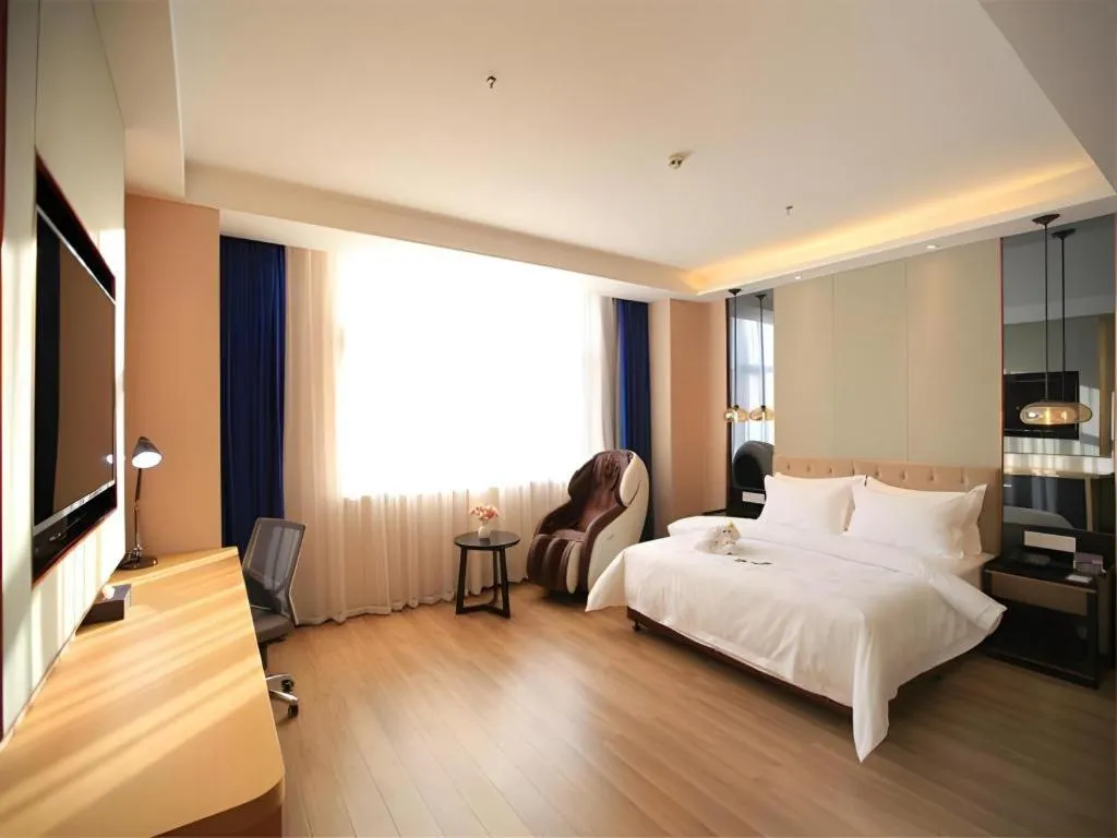 Bed in Jinjiang Metropolo Fuxin Yingbin Street Railway Station