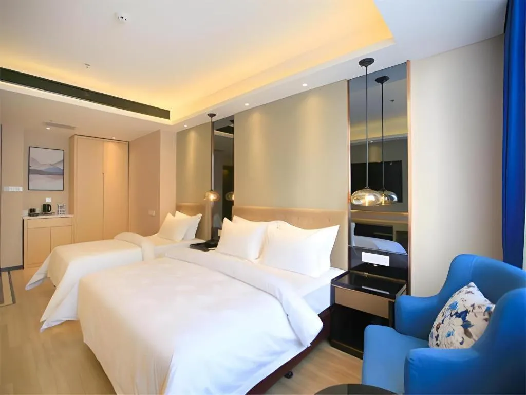 Bed in Jinjiang Metropolo Fuxin Yingbin Street Railway Station