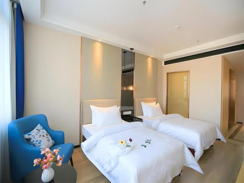 Bed in Jinjiang Metropolo Fuxin Yingbin Street Railway Station