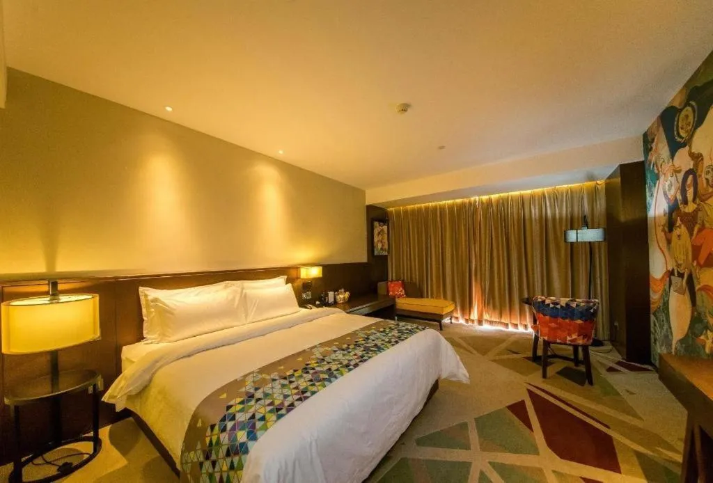 Bed in ZMAX Hotel Guangzhou Luogang Science City Shenzhou Road Metro Station