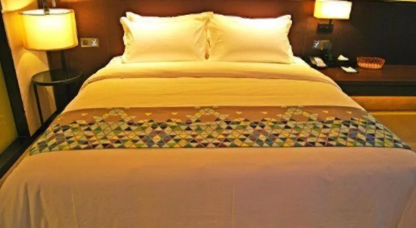 Bed in ZMAX Hotel Guangzhou Luogang Science City Shenzhou Road Metro Station
