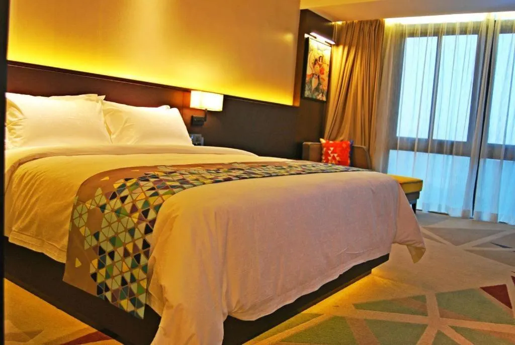 Bed in ZMAX Hotel Guangzhou Luogang Science City Shenzhou Road Metro Station