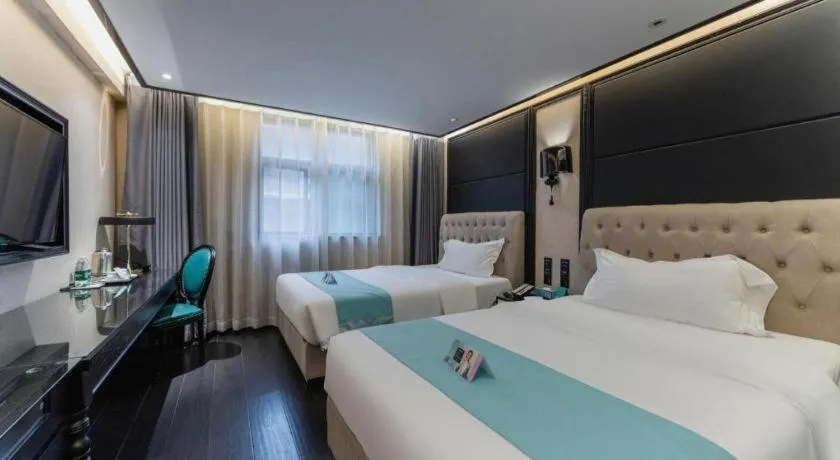 Bed in Xana Hotelle·Nanchang Bayi Square Metro Station