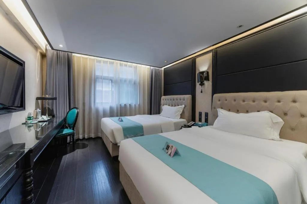 Bed in Xana Hotelle·Nanchang Bayi Square Metro Station