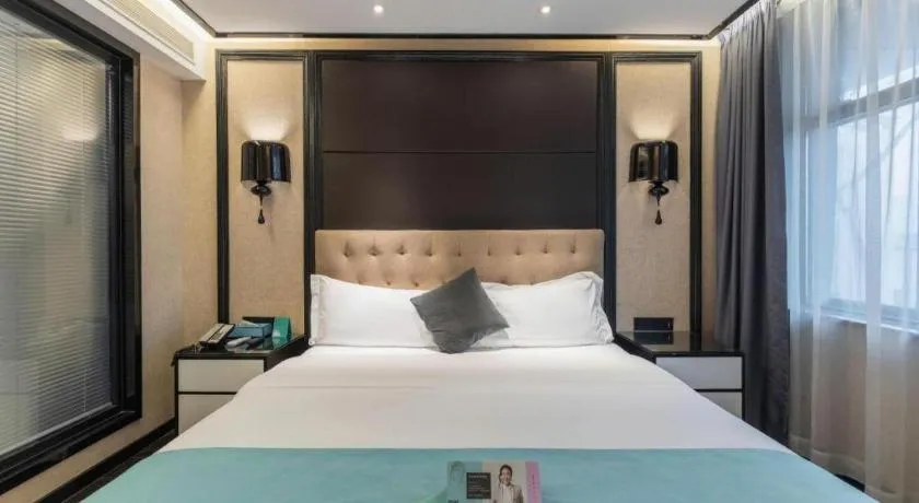 Bed in Xana Hotelle·Nanchang Bayi Square Metro Station