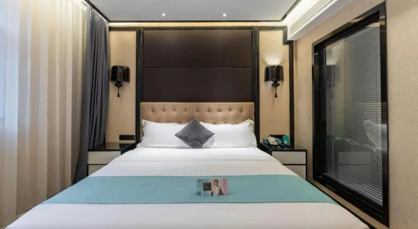 Bed in Xana Hotelle·Nanchang Bayi Square Metro Station