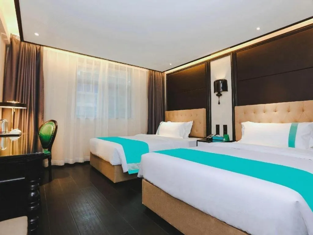 Bed in Xana Hotelle·Nanchang Bayi Square Metro Station