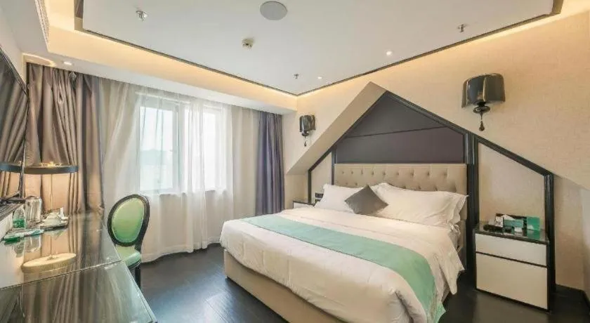 Bed in Xana Hotelle·Nanchang Bayi Square Metro Station