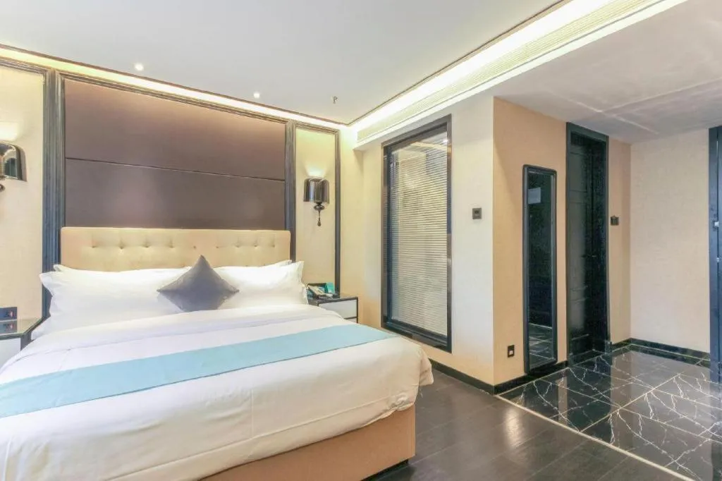 Bed in Xana Hotelle·Nanchang Bayi Square Metro Station