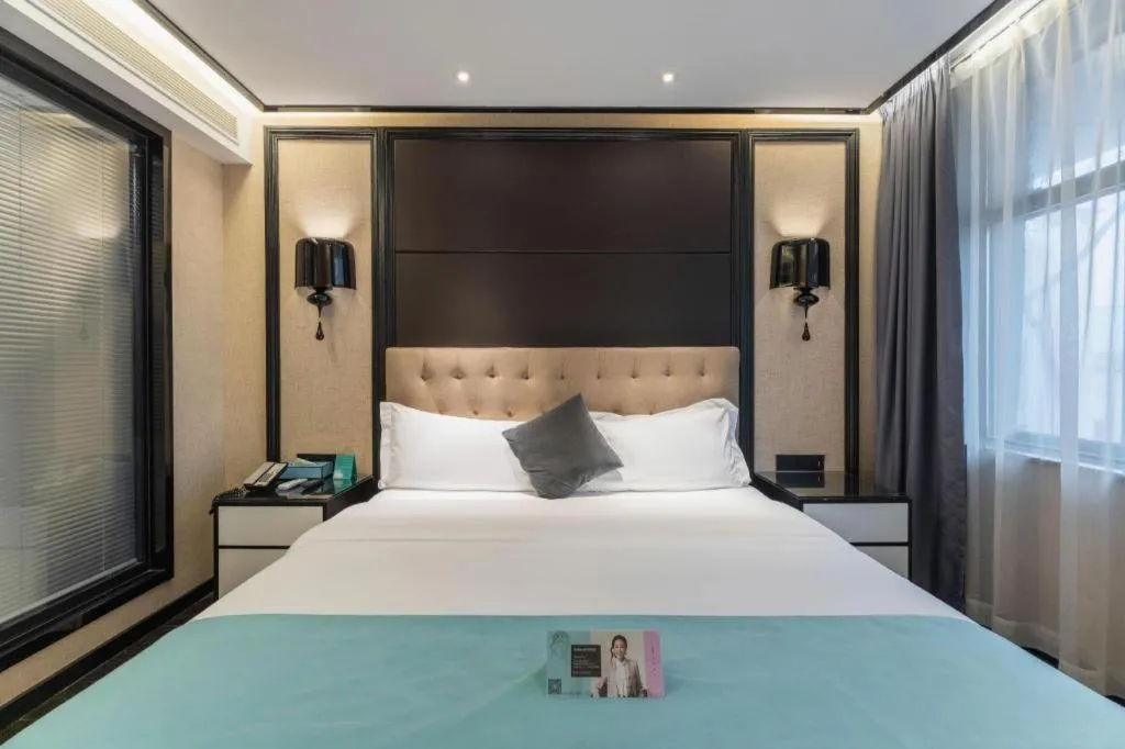 Bed in Xana Hotelle·Nanchang Bayi Square Metro Station