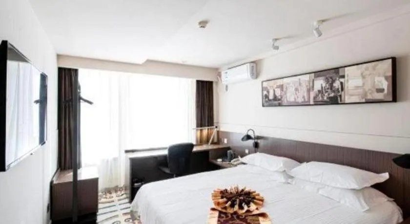 Bed in Jinjiang Inn Select Changchun Yuanda Street