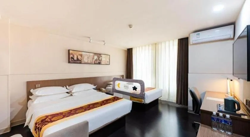 Bed in Jinjiang Inn Select Changchun Yuanda Street