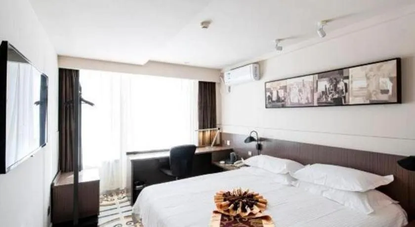 Bed in Jinjiang Inn Select Changchun Yuanda Street