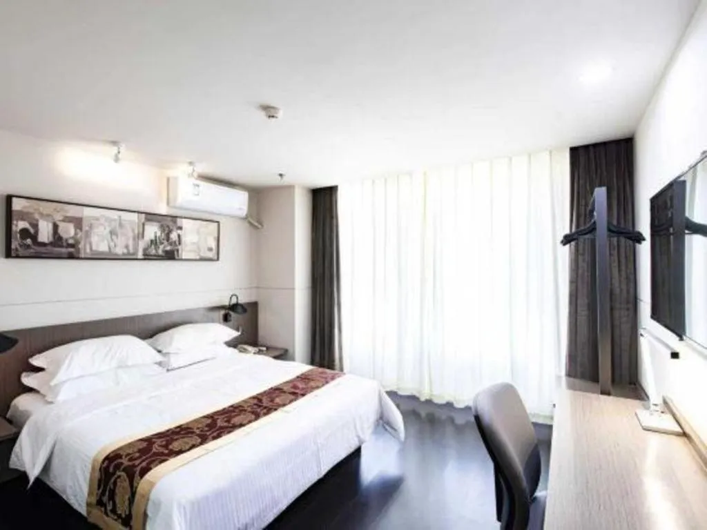 Bed in Jinjiang Inn Select Changchun Yuanda Street