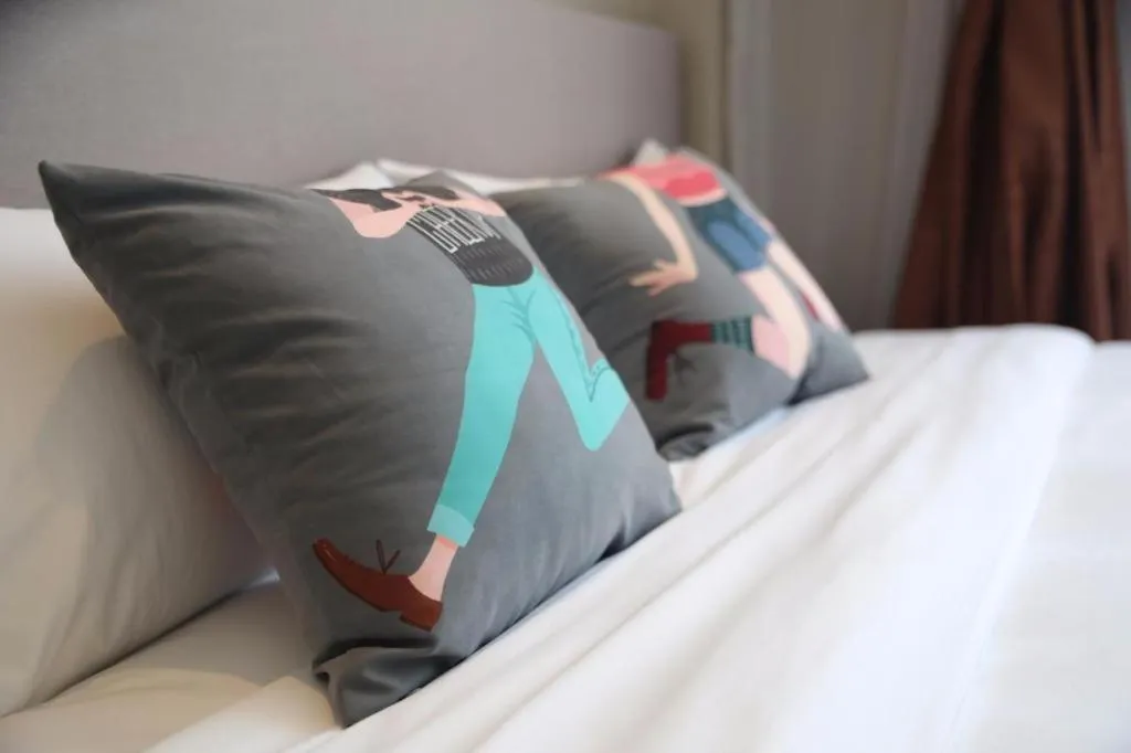 Bed in Pai Hotel Zhenjiang Railway Station South Square