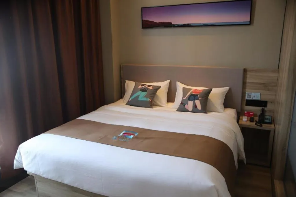 Bed in Pai Hotel Zhenjiang Railway Station South Square