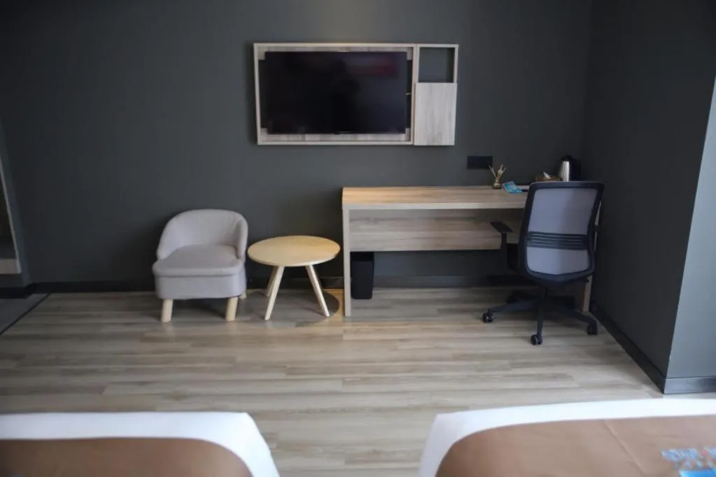 Bed in Pai Hotel Zhenjiang Railway Station South Square