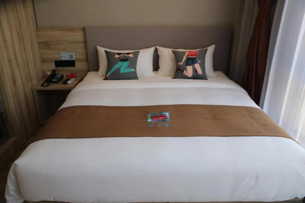 Bed in Pai Hotel Zhenjiang Railway Station South Square