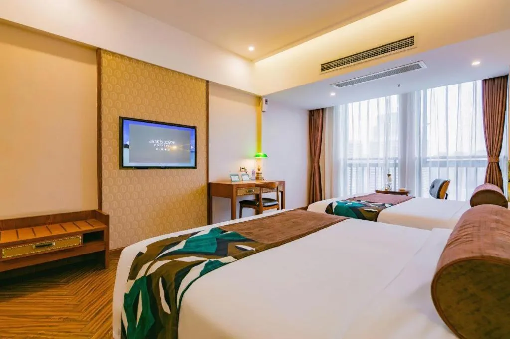 Bed in James Joyce Coffetel Chengdu Century City Convention and Exhibition Center