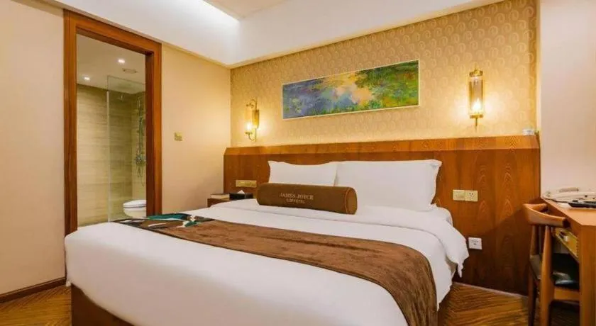 Bed in James Joyce Coffetel Chengdu Century City Convention and Exhibition Center