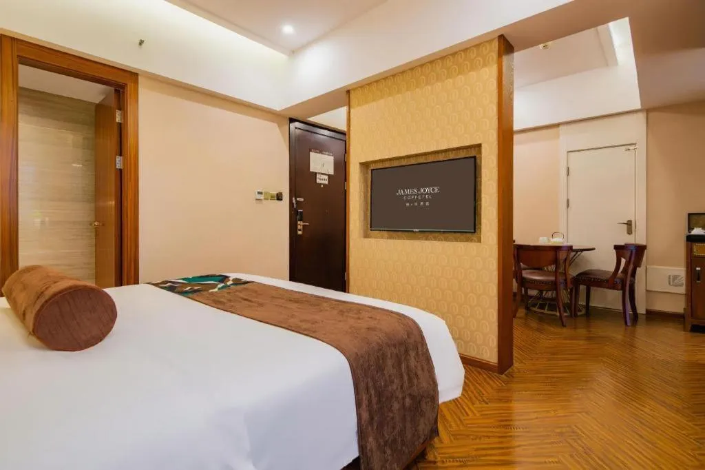 Bed in James Joyce Coffetel Chengdu Century City Convention and Exhibition Center
