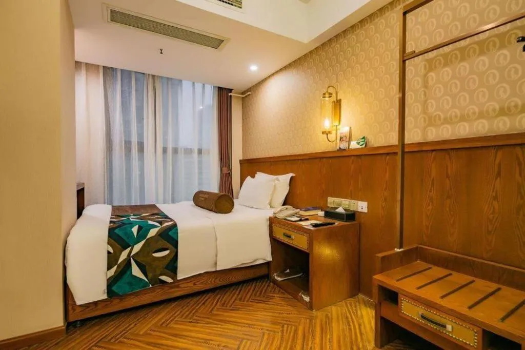 Bed in James Joyce Coffetel Chengdu Century City Convention and Exhibition Center