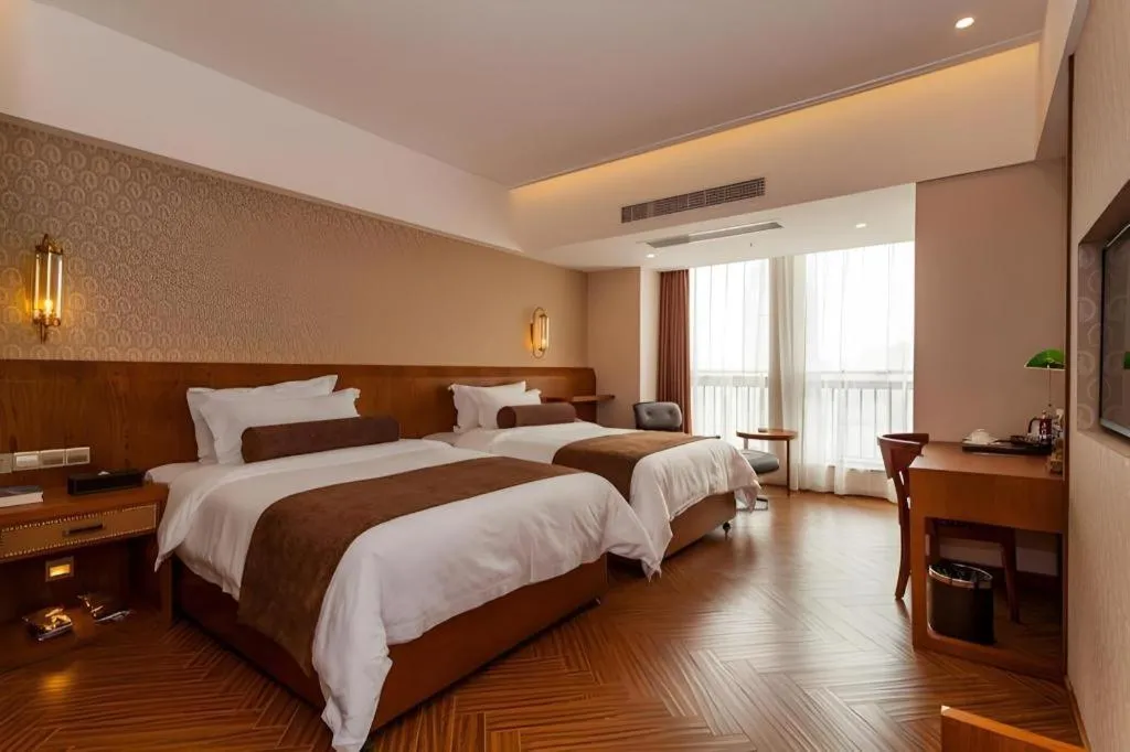 Bed in James Joyce Coffetel Chengdu Century City Convention and Exhibition Center