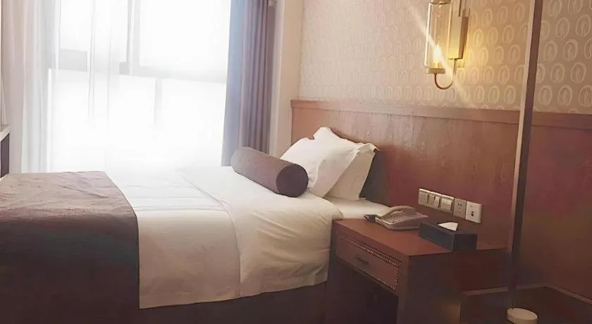 Bed in James Joyce Coffetel Chengdu Century City Convention and Exhibition Center