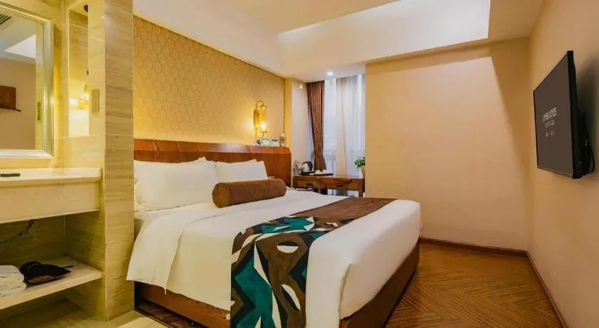 Bed in James Joyce Coffetel Chengdu Century City Convention and Exhibition Center