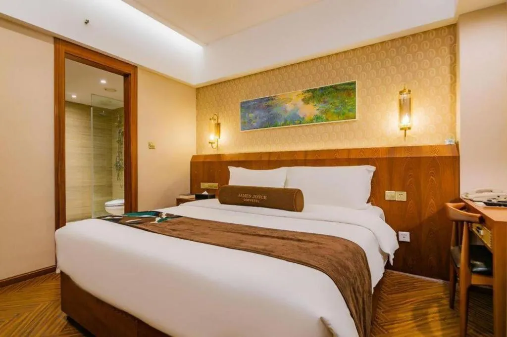 Bed in James Joyce Coffetel Chengdu Century City Convention and Exhibition Center