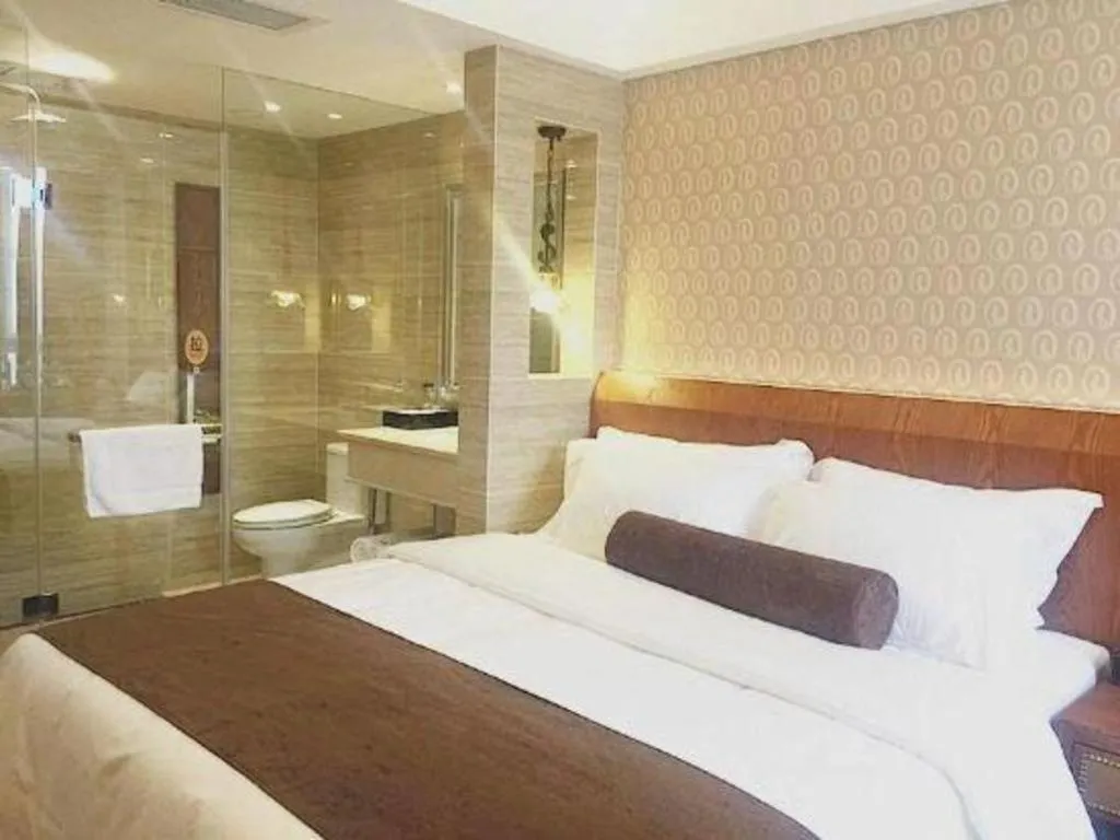 Bed in James Joyce Coffetel Chengdu Century City Convention and Exhibition Center