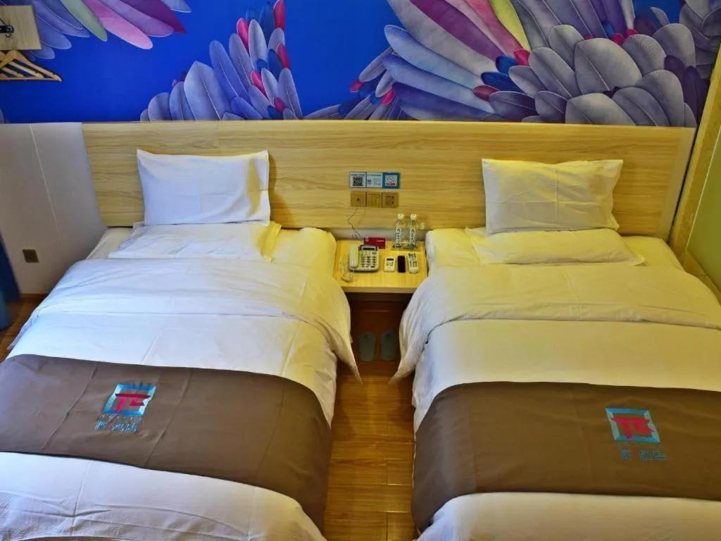 Bed in Hotel Pai Hezhou Lingfeng Plaza
