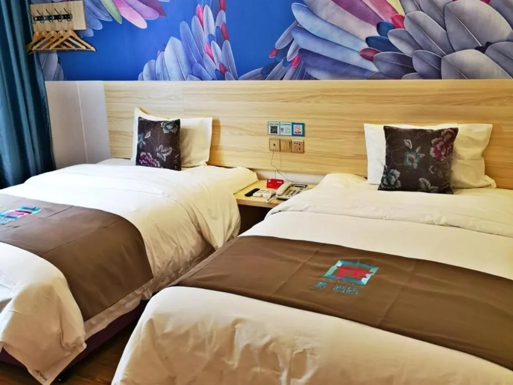 Bed in Hotel Pai Hezhou Lingfeng Plaza